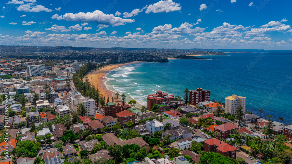 Fototapeta premium Aerial View of Manly Beach and Sydney harbour with manly houses on a warm summer day blue skies Sydney NSW Australia