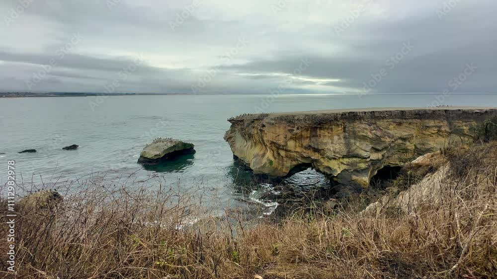 Seabird Rock View at Dinosaur Caves Park on a Cloudy Day, Pismo Beach, California. Pacific Ocean. 