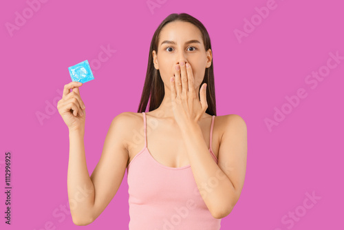 Shocked young woman with co...