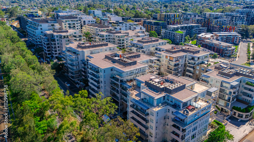 Panorama Aerial view above Rhodes with views to Meadowbank and Olympic park and Wentworth Point and Concord West with Parramatta River in Sydney NSW Australia photo