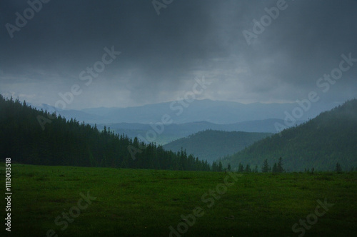 dark clouds of the sky on a cloudy day in Ukrainian Carpathians, fragment of ...