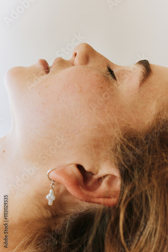 Closeup portrait of woman with closed eyes photo