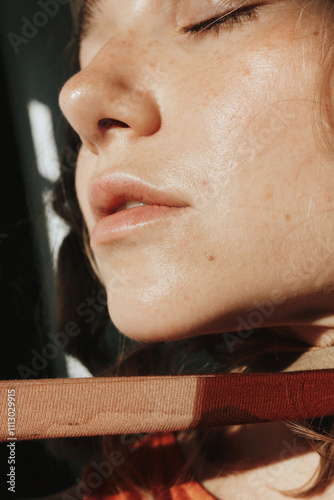 Closeup portrait of woman with glow skin