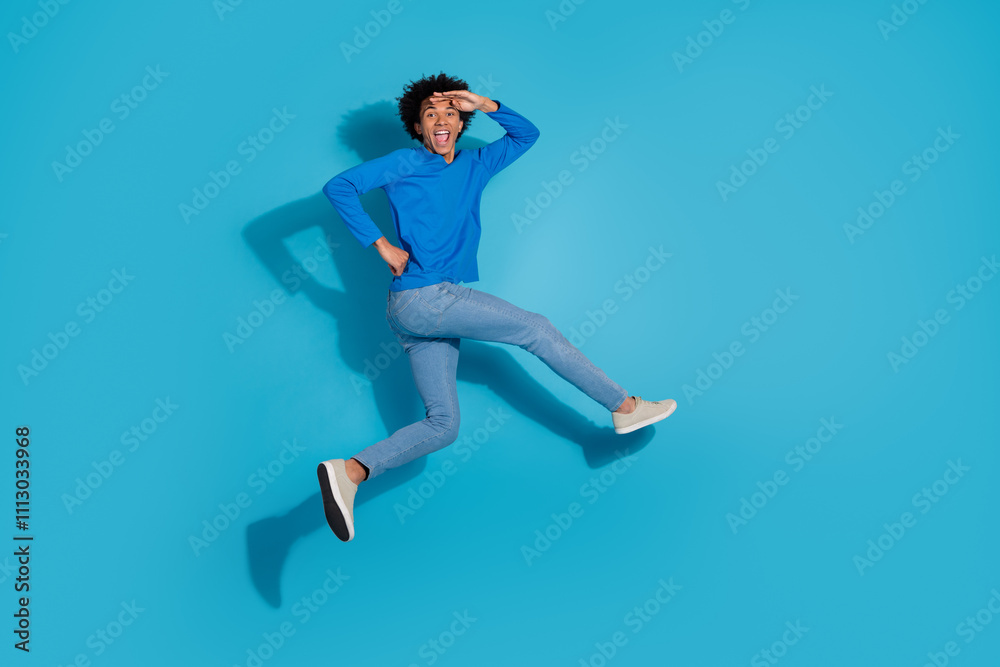Fototapeta premium Full size photo of pretty young male touch forehead running wear trendy outfit isolated on blue color background