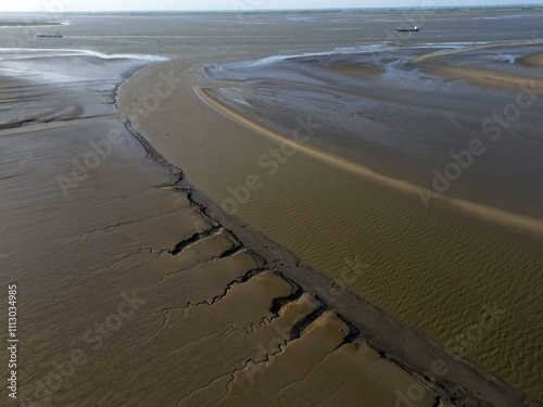 Aerial view of tidal channels and gullies, Saeftinge, The Netherlands photo