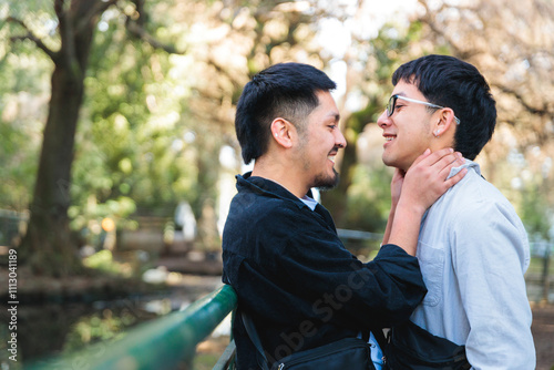 Gay couple caressing each other in the park