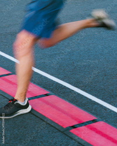 A runner crosses the finish line  photo