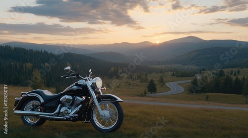 Black motorcycle front wheel rests on a cracked asphalt road, surrounded by vibrant green foliage under clear daylight photo