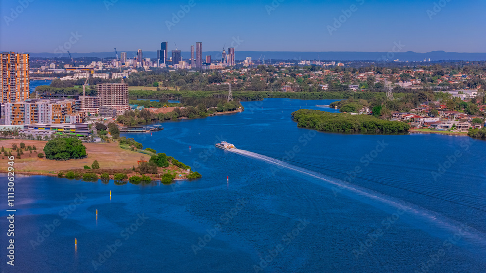 Obraz premium Panorama Aerial view above Rhodes with views to Meadowbank and Olympic park and Wentworth Point and Concord West with Parramatta River in Sydney NSW Australia