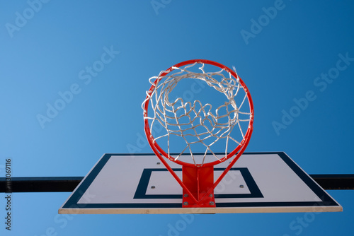 Basketball Hoop Against Clear Blue Sky photo