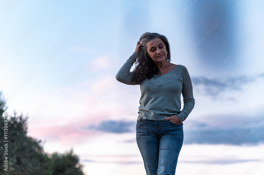 Pensive woman walks alone in deep thoughts Pensive woman walks alone in deep thoughts