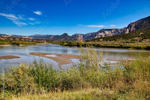 View of the Green River and the Uintas while Hiking in Dinosaur National Monument Utah. photo