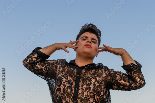 Non-binary person dancing on the roof, close up photo