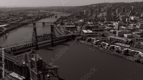 MAY 2024, PORTLAND OREGON, USA - aerial view of Willamet River running through downtown Portland Skyline, Oregon