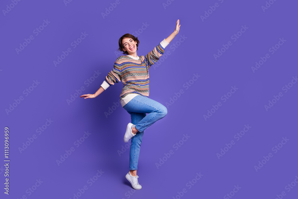 Photo of pretty positive nice woman wear stylish clothes have fun good mood isolated on purple color background Photo of pretty positive nice woman wear stylish clothes have fun good mood isolated on purple color background