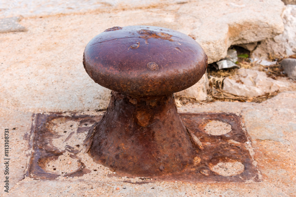 Iron bollard, for tying ships and boats, anchoring ships and boats, iron pole for tying ships, an iron totem for anchoring ships. Iron bollard, for tying ships and boats, anchoring ships and boats, iron pole for tying ships, an iron totem for anchoring ships.
