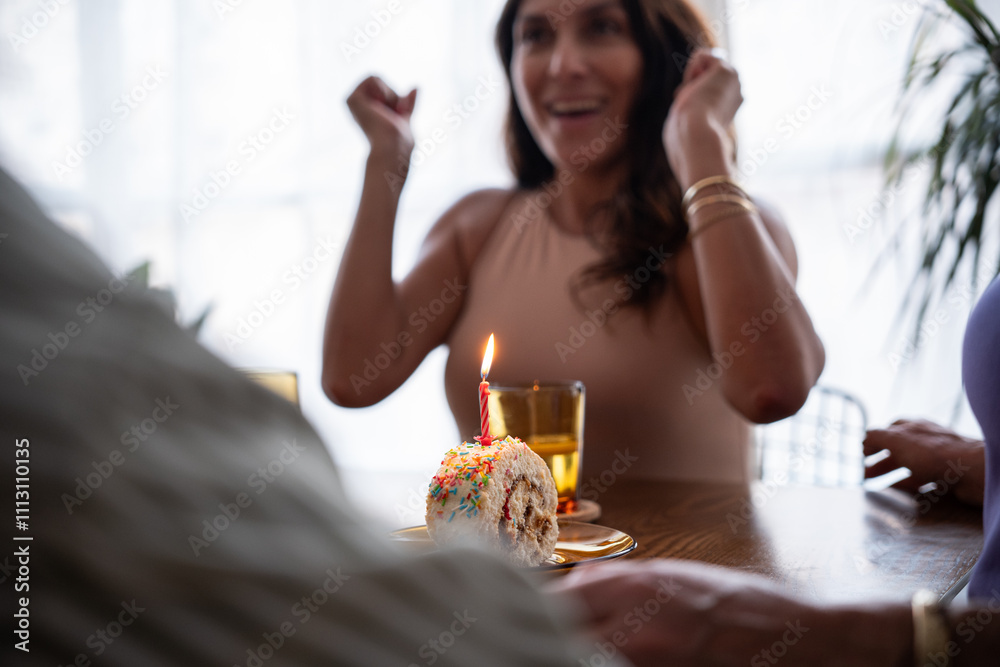 Woman celebrating birthday party with cake Woman celebrating birthday party with cake