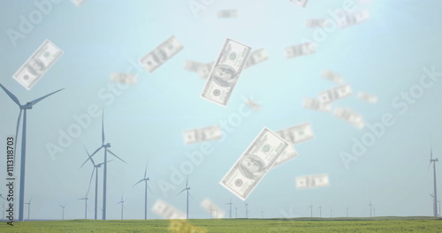 Wallpaper Mural Falling dollar bills image over wind turbines in green field Torontodigital.ca
