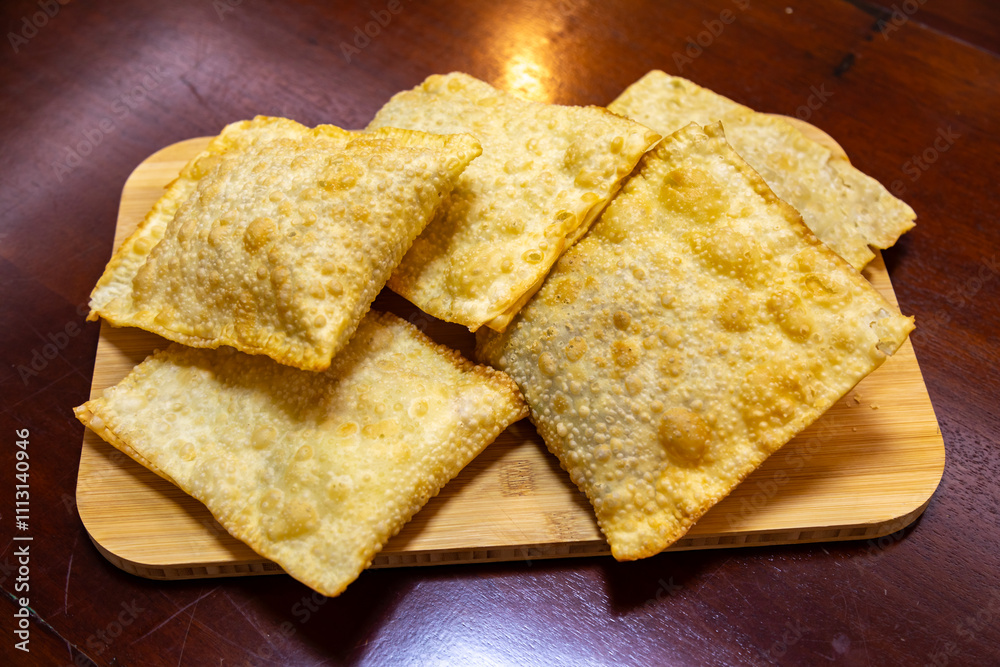Fototapeta premium Traditional Brazilian fried pastry stuffed with ground beef.