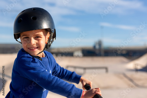 Smiling kid with Helmet at Skatepark