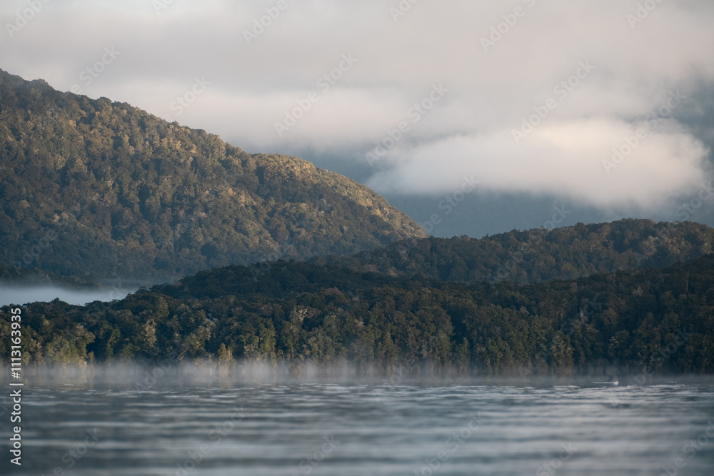 Morning Fog Rises above tree covered ranges. Morning Fog Rises above tree covered ranges.