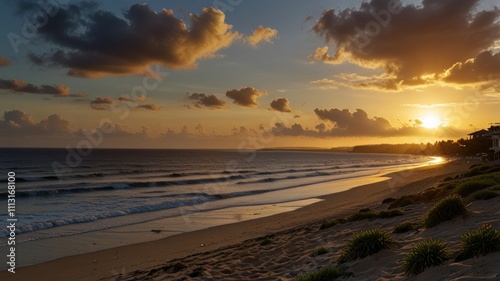 Golden sunset over a tropical beach, tranquil ocean waves gently lapping on the shore, dramatic clouds.