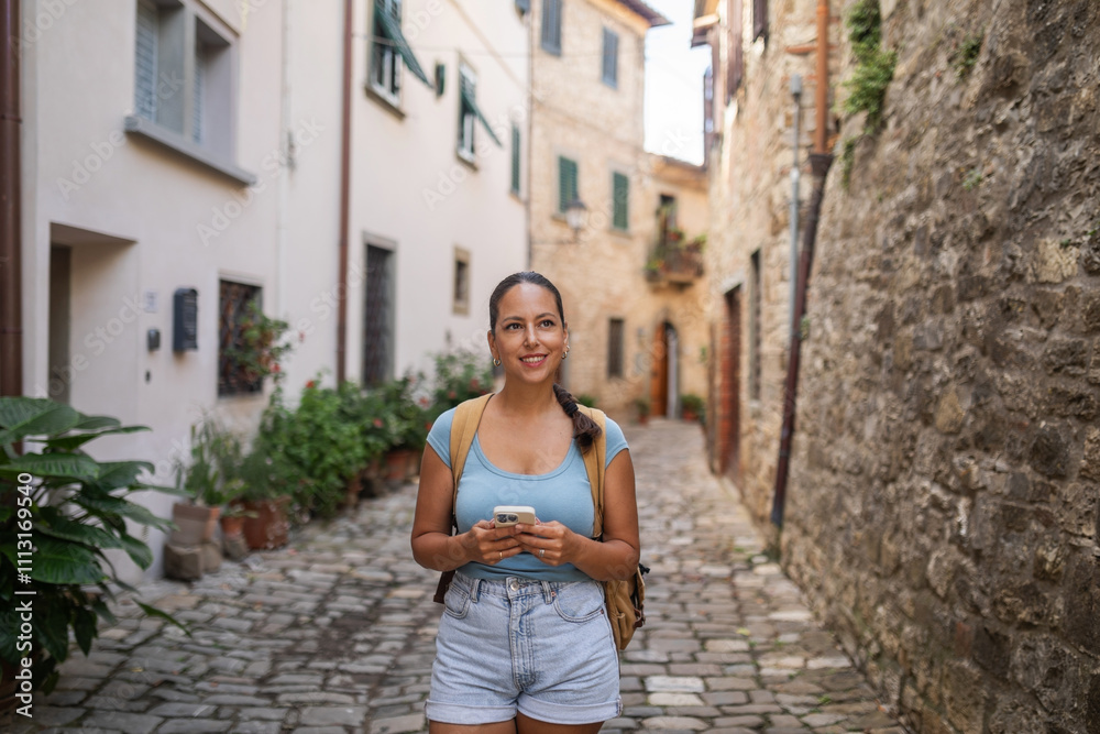 tourist woman visiting a town in tuscany in italy tourist woman visiting a town in tuscany in italy