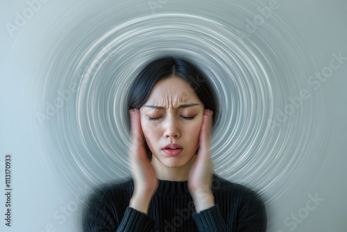 Dizziness effects: Portraying woman experiencing vertigo, capturing physical confusion, emotional impact of balance challenges, health struggles, wellness, medical issues. photo