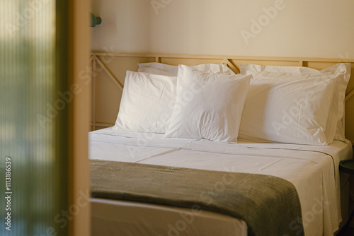 Cozy and inviting bedroom with a neatly made bed 