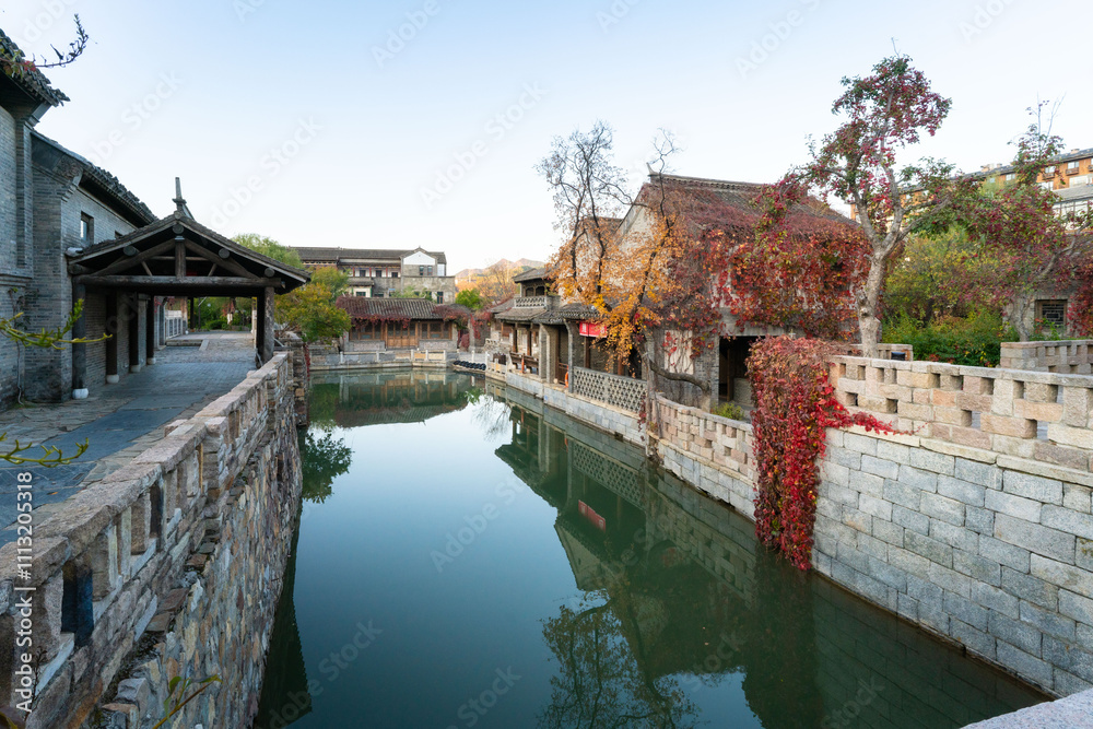 Naklejka premium Gubei Water Town, Beijing, China. Tranquil scene during autumn morning. 
