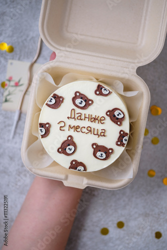 Bento cake as a gift for the holiday. Korean style cakes in a box for one person. Translation: 