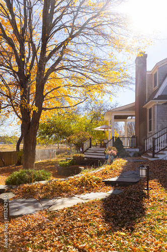 House chimney porch with colorful fall foliage  photo