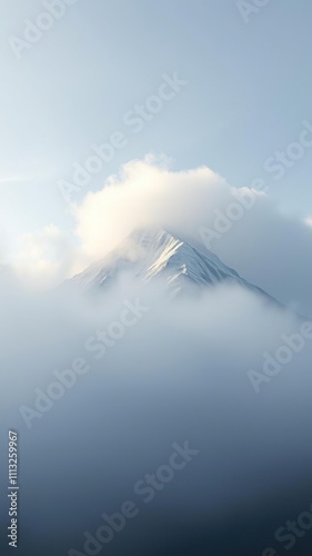 The misty veil of fog lifts to reveal a towering peak in the Altai Mountains , alashan range , rugged terrain, foggy peaks photo