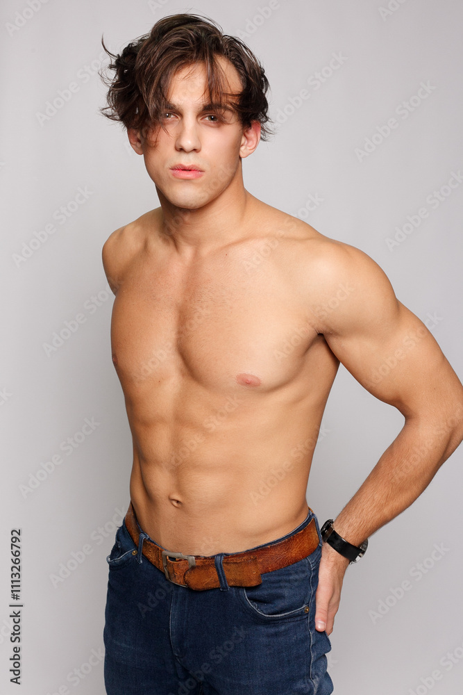 Portrait of a young muscular man with naked torso Portrait of a young muscular man with naked torso