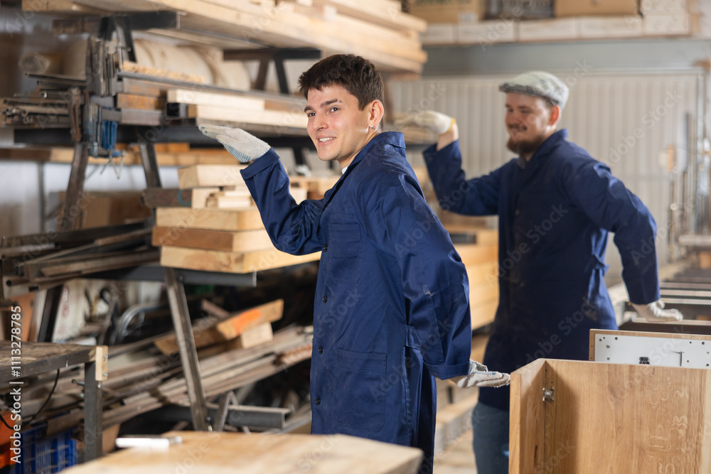 Two funny sawmill workers perform various funny acrobatic moves Two funny sawmill workers perform various funny acrobatic moves