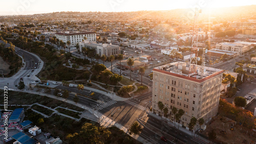 San Pedro, Los Angeles, California, USA - November 12, 2024: Sunset light shines on the historic downtown city hall and surrounding buildings.
