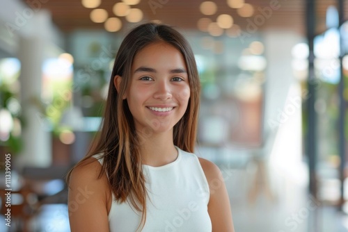 Latin college student teacher poses in university campus and office.