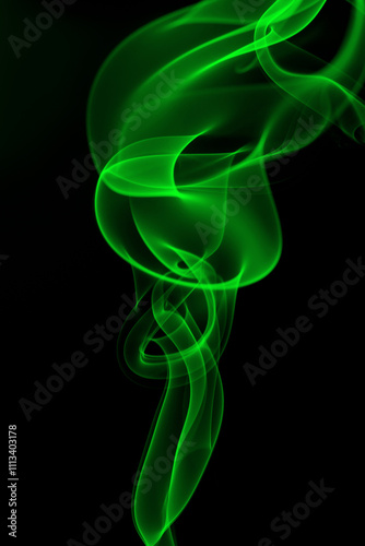 Green smoke abstract on black background for design. darkness concept