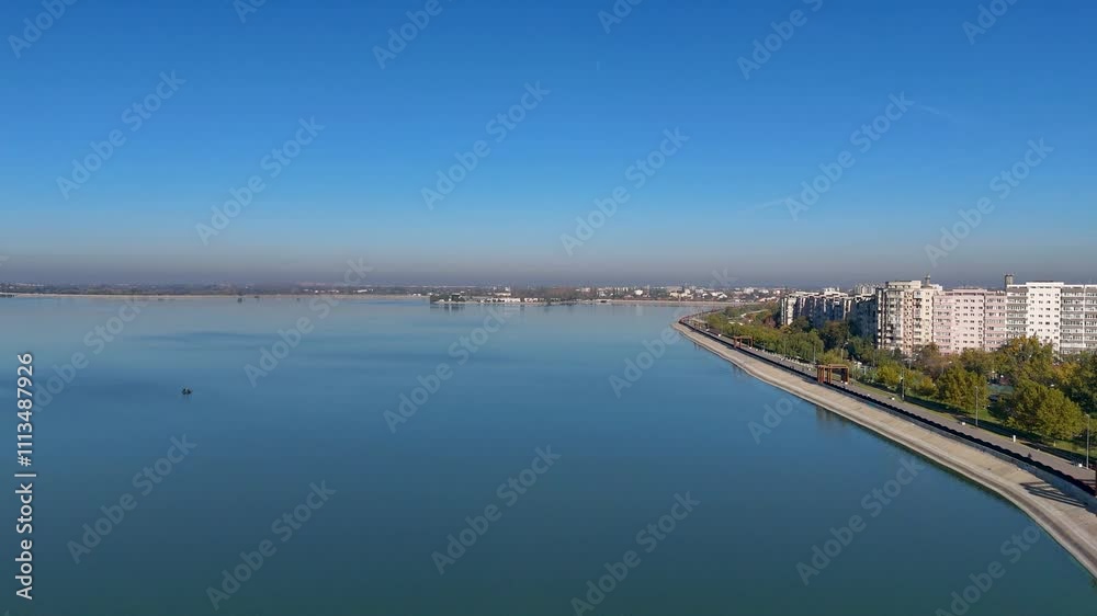 Bird’s Eye View of Lacul Morii in Crangasi, with Urban Apartments in the Background, Sector 6, Bucharest, Romania Bird’s Eye View of Lacul Morii in Crangasi, with Urban Apartments in the Background, Sector 6, Bucharest, Romania