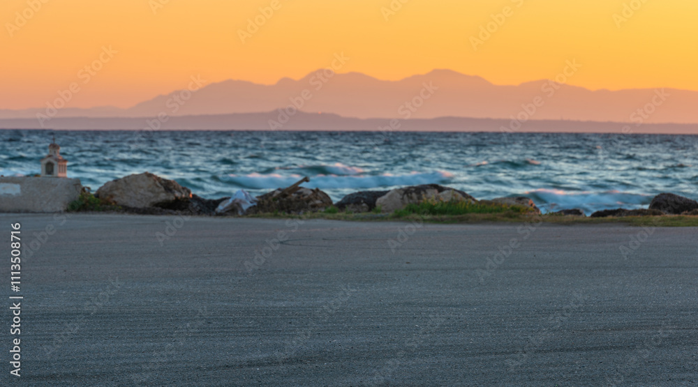 cgi backplate production.Asphalt parking lot flight with sea view during sunrise