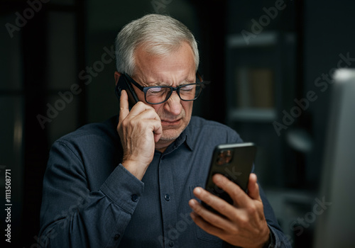 A mature man in his 50s or older experiencing phone and vision problems, dealing with eyesight issues such as myopia or glaucoma in an office setting. Struggling to read blurry emails online while squ