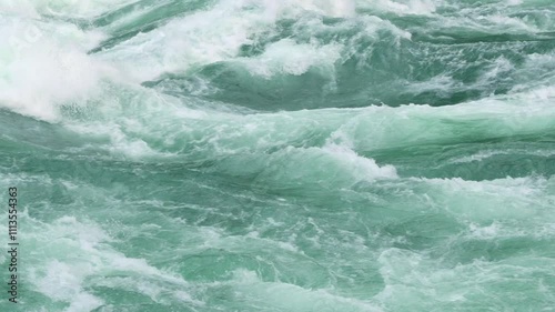 Turbulent river rapids dynamic powerful river rapids with swirling turquoise waters, showcasing force of nature beauty of flowing water. powerful river rapids with swirling turquoise waters