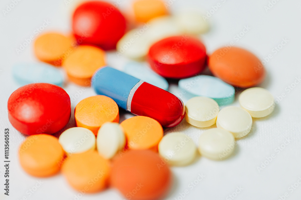 Close up photo of colorful medication tablets and capsules Close up photo of colorful medication tablets and capsules