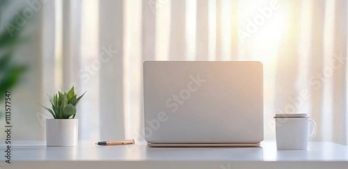 Workspace setup with laptop, notebooks, and coffee in a bright environment
