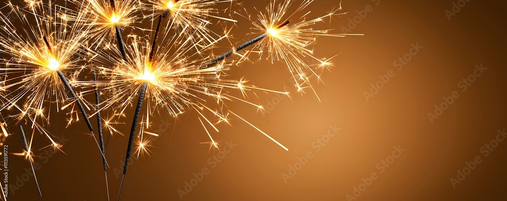 Obraz premium Festive Sparklers Shining Against a Warm Background