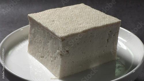 Tofu made by boiling soybeans. A healthy dish made from soybean. A close-up of Korean tofu made by boiling beans.
