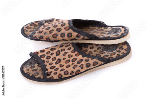 Old worn leopard slippers photo