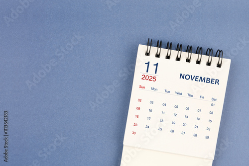 Wallpaper Mural November 2025 Mini monthly desk calendar for 2025 year on blue color background. Torontodigital.ca