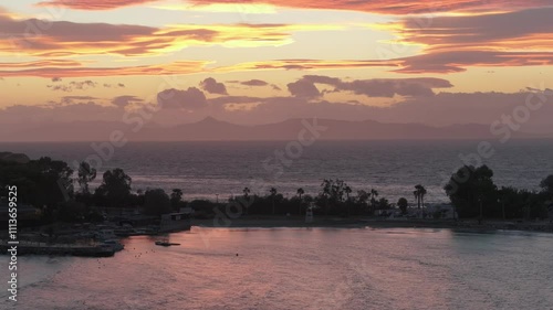 Colorful sunset in Vouliagmeni, Athens, Greece with beautiful clouds