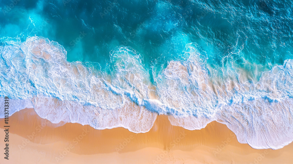 Aerial view of vibrant turquoise ocean waves on sandy beach Aerial view of vibrant turquoise ocean waves on sandy beach